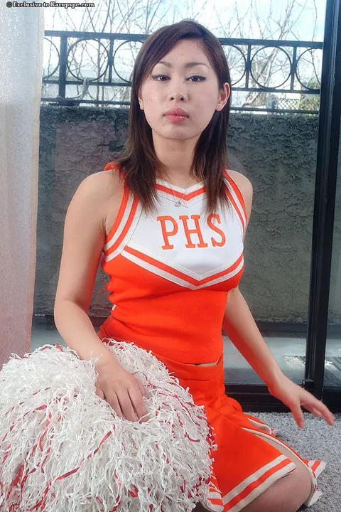 Asian Brunette Spreads in Her Uniform – photo 1 of 16