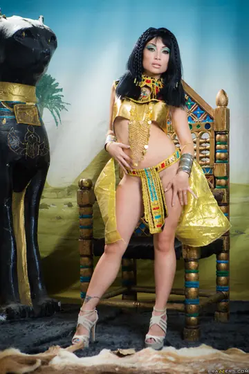 Rina Ellis – Petite Korean in Costume and Heels Flashes Her Big Tits