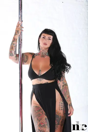 Tattooed BBW with Big Tits Performs Pole Dance