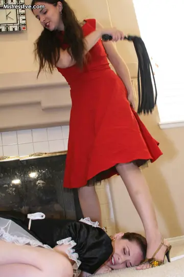Brunette in a Skirt and Heels Gets Feet Worshipped by Maid