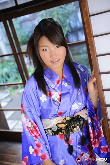 Japanese Brunette Lets Her Kimono Robe Slip Off Her Shoulders