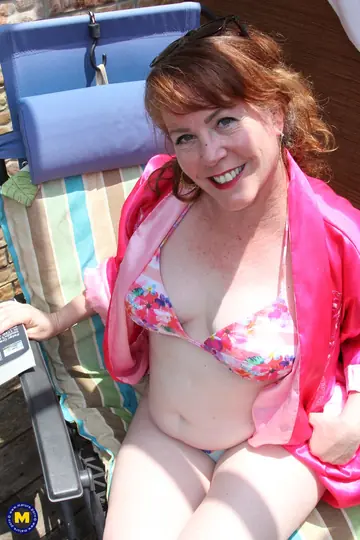 Busty European Redhead MILF Fingers Her Pussy Outdoors