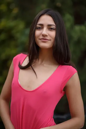 Skinny European Brunette Undresses and Shows Her Shaved Pussy