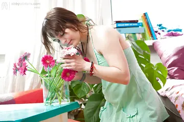 Busty Woman in a Skirt Pees into a Cup and Spreads