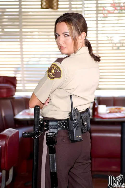 Devinn Lane: Thick Brunette MILF in Uniform Poses with Big Tits – photo 8 of 17