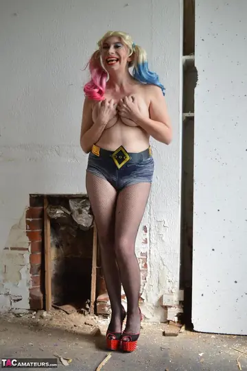 Mature British Blonde in Costume and Crotchless Pantyhose Fingers Her Pussy