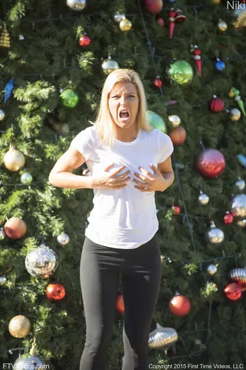 Blonde MILF in Yoga Pants Spreads Her Pussy with Water Hose