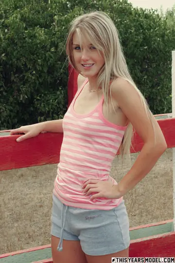 Blonde Amateur Strips Out of Her Shorts on the Backyard Deck