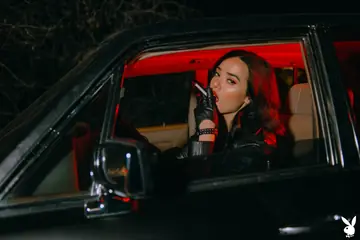 Lily Andrews – Latina MILF in a Bikini, Boots and Stockings Spreads in the Car