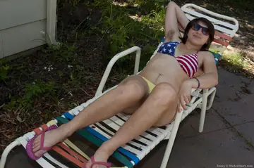 Zooey – Busty Short-Haired Brunette in a Bikini Spreads Her Hairy Pussy Outdoors