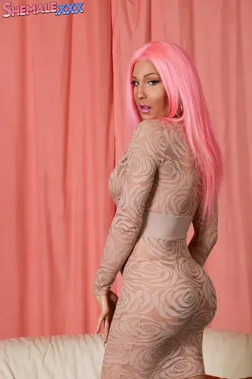 Trans Woman Lets Her Dress Fall to the Floor and Poses Nude Front and Back