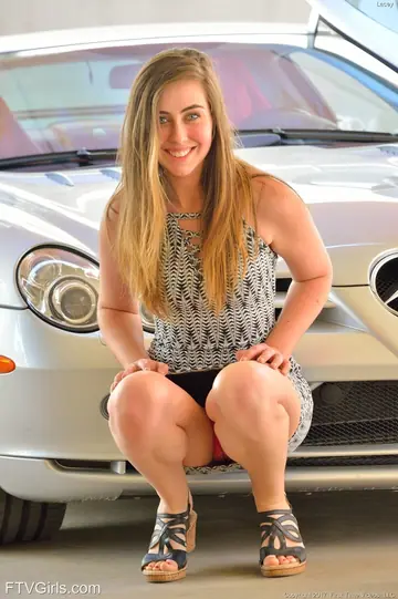 Woman Fingers Her Ass and Rides a Dildo on a Car Outdoors