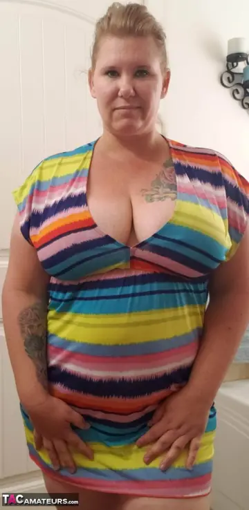 Mature Blonde BBW Strips Out of Her Dress and Poses Nude in the Bathroom