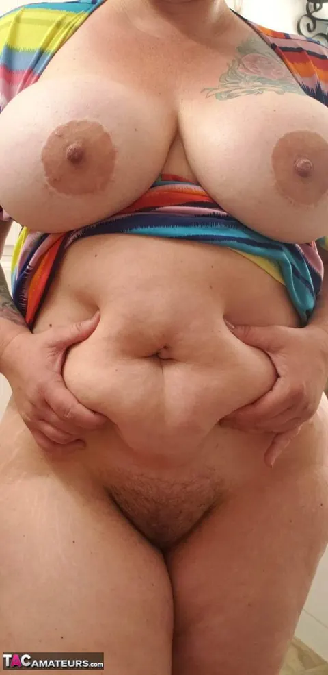 Busty Kris Ann: Mature Blonde BBW Strips Out of Her Dress and Poses Nude in the Bathroom – photo 9 of 20