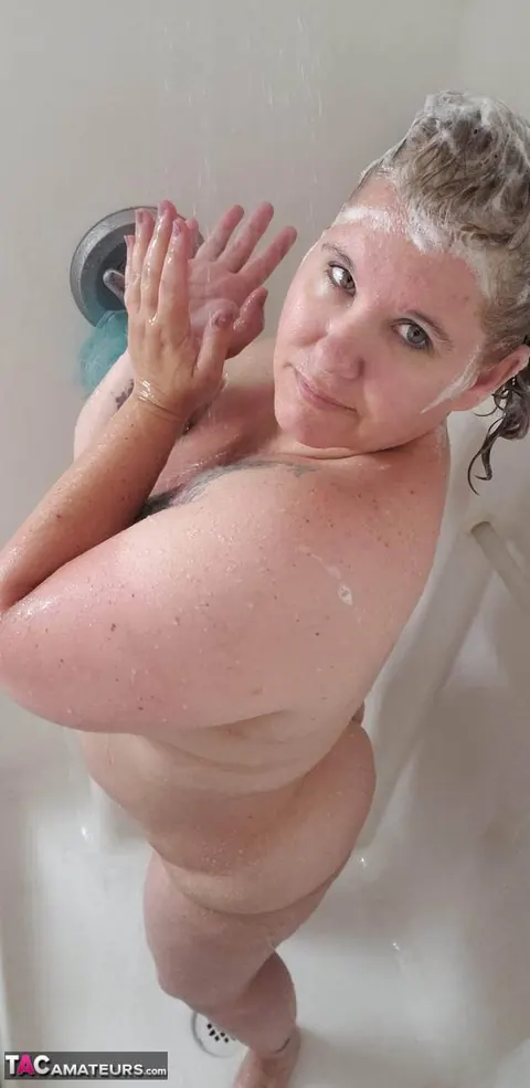 Busty Kris Ann: Mature Blonde BBW Strips Out of Her Dress and Poses Nude in the Bathroom – photo 16 of 20
