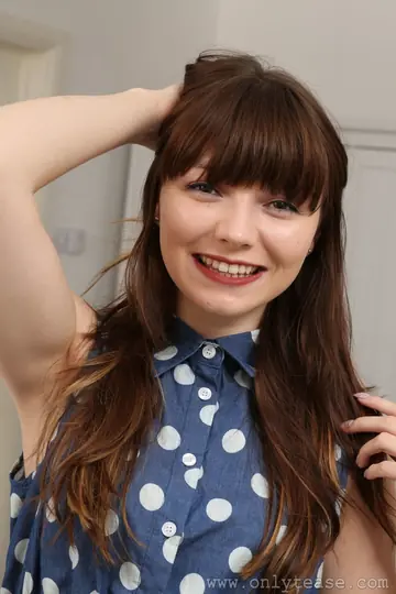 Brunette Strips Out of Her Skirt