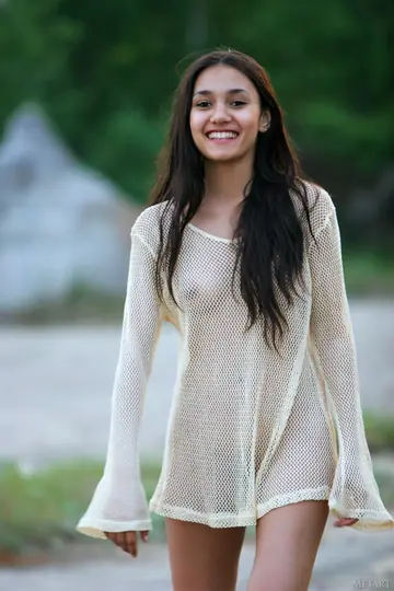 Slim Brunette with Small Natural Tits Strips Nude Outdoors