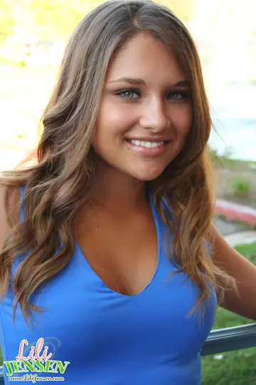 Lili Jensen – Brunette Lifts Her Skirt to Show a Thong Outdoors