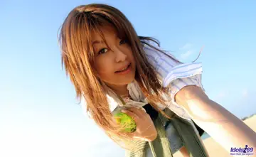 Japanese Redhead MILF Strips Out of Her Bikini on the Beach
