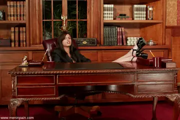 Shy Love – Busty Latina in Uniform and Heels Kisses Bound Man in the Office