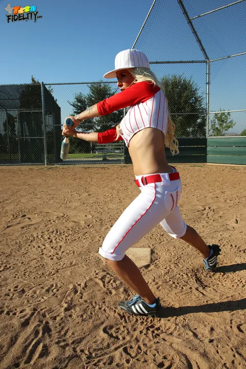 Stevie Shae: Blonde in Softball Uniform Flashes Her Natural Tits Outdoors – photo 12 of 17