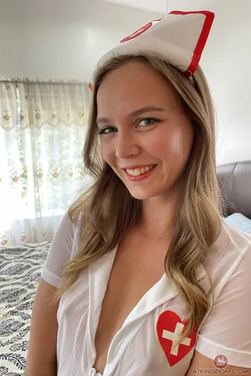 Thick Blonde in Nurse Costume and Heels Poses to Show Her Big Ass