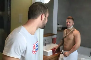 Tattooed Brunette Guy Deepthroats and Takes a Toy