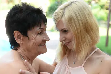 Candy Sweet – Mature Brunette in a Bikini Seduces Short-Haired Woman for Lesbian Sex