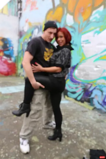 Jolyne Joy – German MILF with Short Red Hair Poses Topless Outdoors
