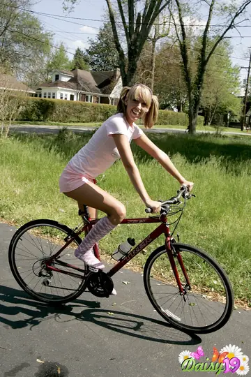 Blonde in Shorts and Socks Strips and Shows Her Ass
