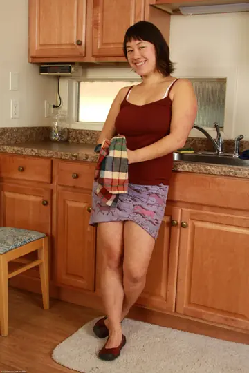 Petite European MILF Lifts Her Skirt to Show Her Hairy Bush