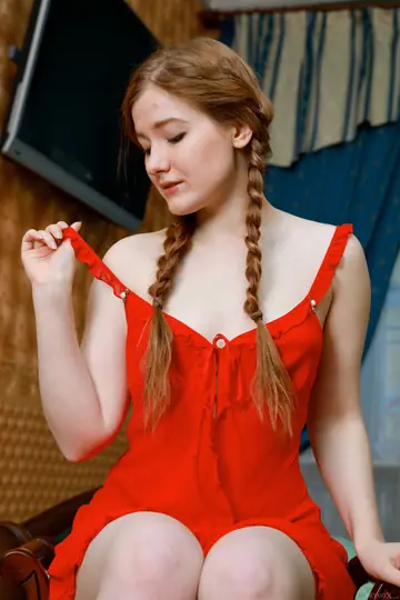Pale Russian Redhead in Pigtails Undresses and Fingers Her Hairy Pussy
