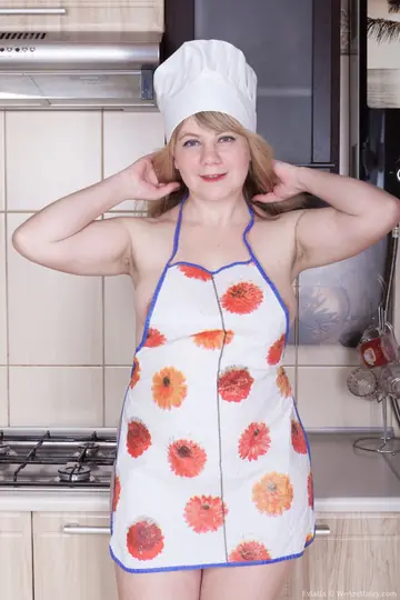 Chubby Blonde Bares Her Hairy Pussy in the Kitchen