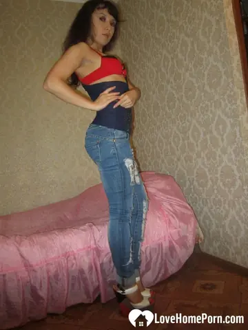 Slim Curly Brunette Strips Out of Her Lingerie and Uses a Dildo