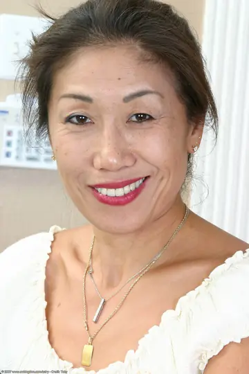 Mature Asian Woman Spreads Her Hairy Pussy