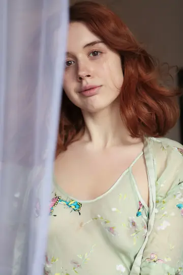 Slim Redhead Spreads Her Shaved Pussy