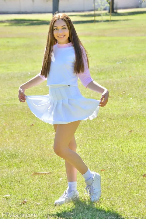 Kelly Kitten: Brunette in a Skirt and Socks Lifts Her Hem and Spreads – photo 10 of 20