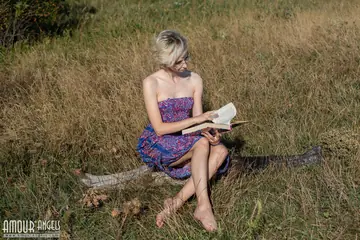 Skinny Blonde in Glasses Strips Out of Her Skirt in the Forest