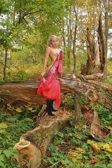 Woman Keeps Leather Boots On and Spreads in the Forest