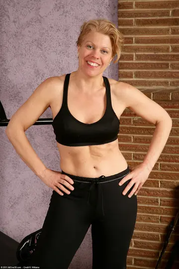 Busty Amateur MILF Undresses at the Gym Showing Her Mature Body