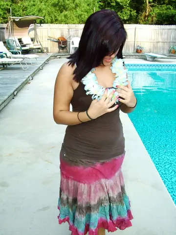 Roxy Belladonna – Redhead Strips Out of Her Dress to a White Bra Outside