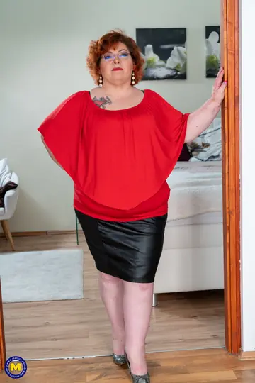 Mature Redhead BBW Strips Nude in the Bedroom