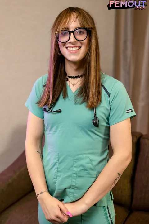 Trans Nurse Undresses and Poses Nude – photo 1 of 16