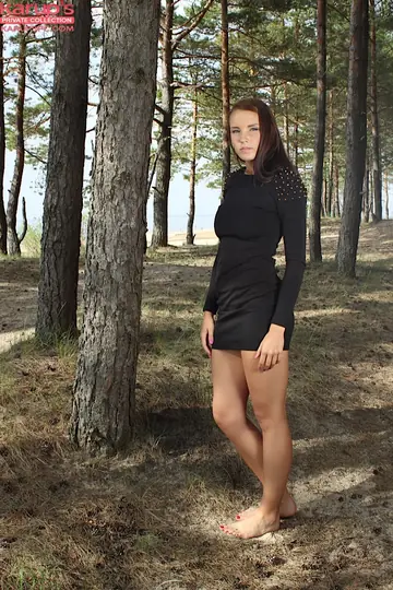 Busty Brunette Strips Out of Her Skirt Outdoors and Spreads