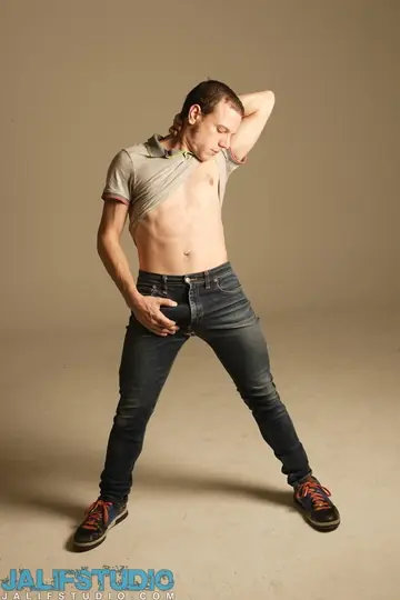 Man Strips Nude on a Chair and Poses