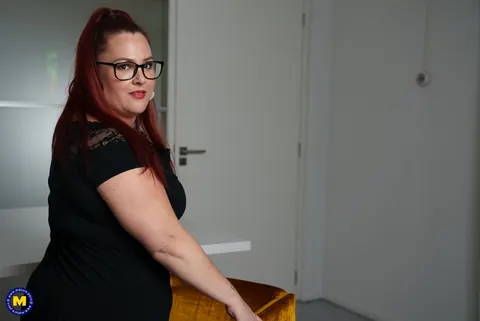 European MILF Teases Cleavage in Glasses – photo 15 of 17