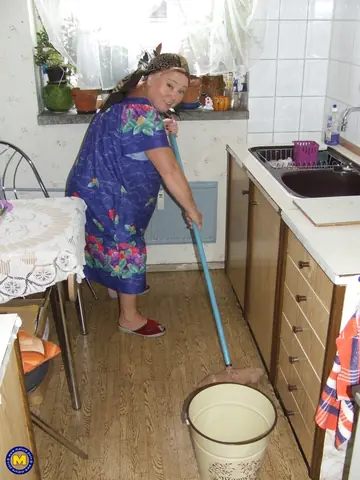 Thick Mature European Woman Strips Naked in the Kitchen