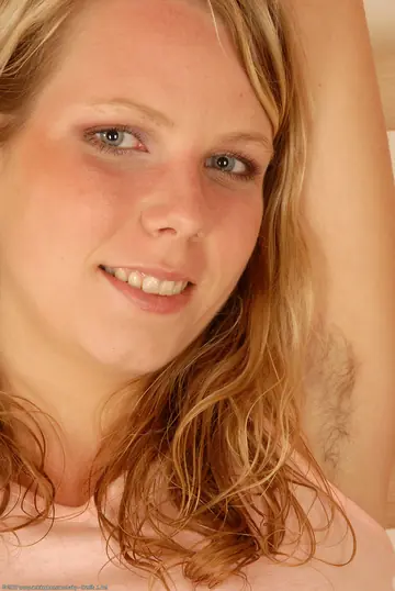 Blonde with Big Tits Poses Nude Showing Her Hairy Pussy