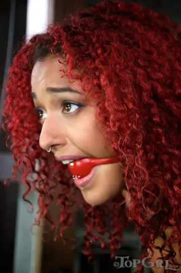 Daisy Ducati – Tall Ebony Redhead in a Latex Skirt Gets Restrained and Squirts