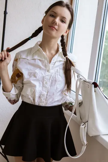 Pigtail Babe Spreads Her Hairy Pussy Wide